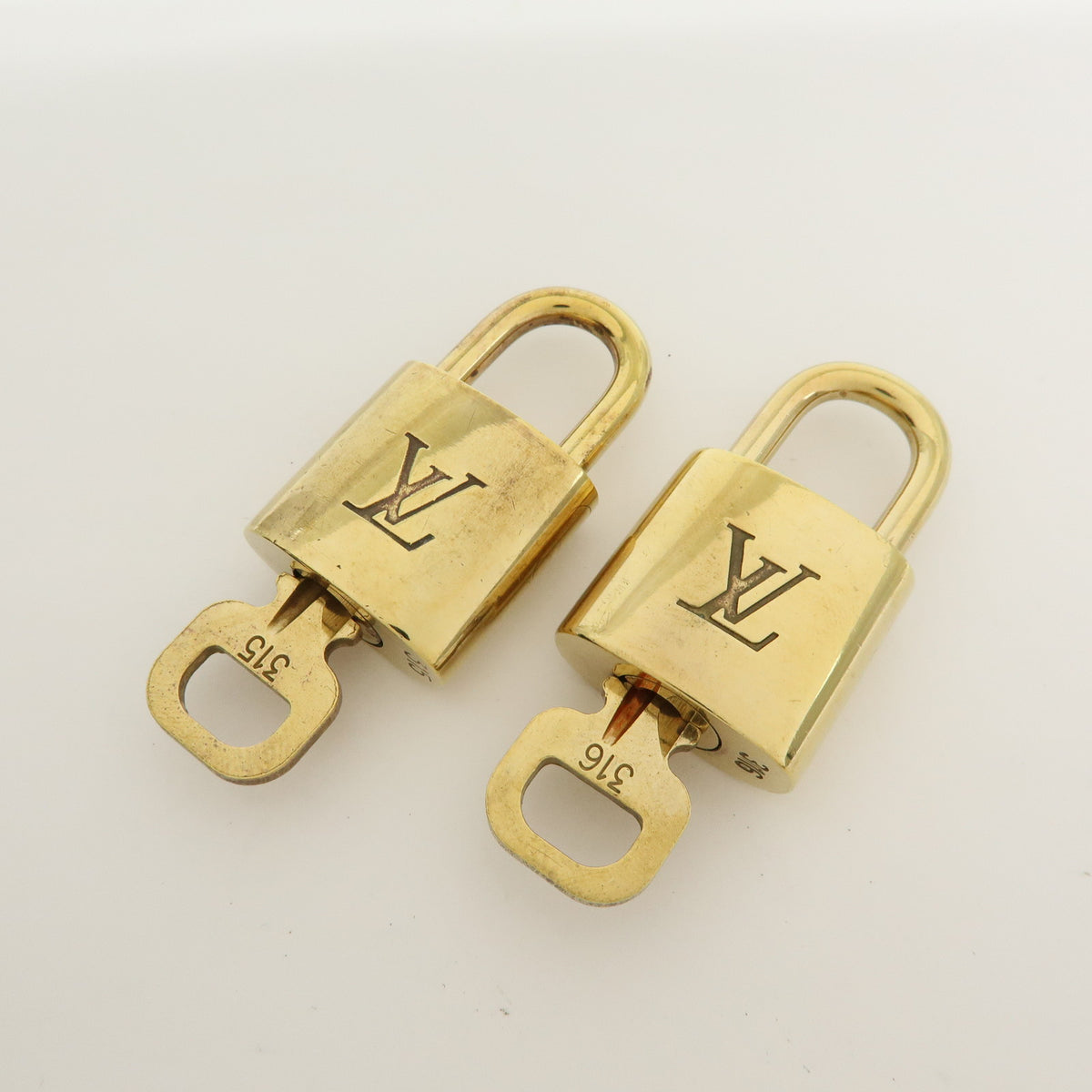 Louis Vuitton Lot of 10 Metal Lock & Key Cadena Key Lock Gold