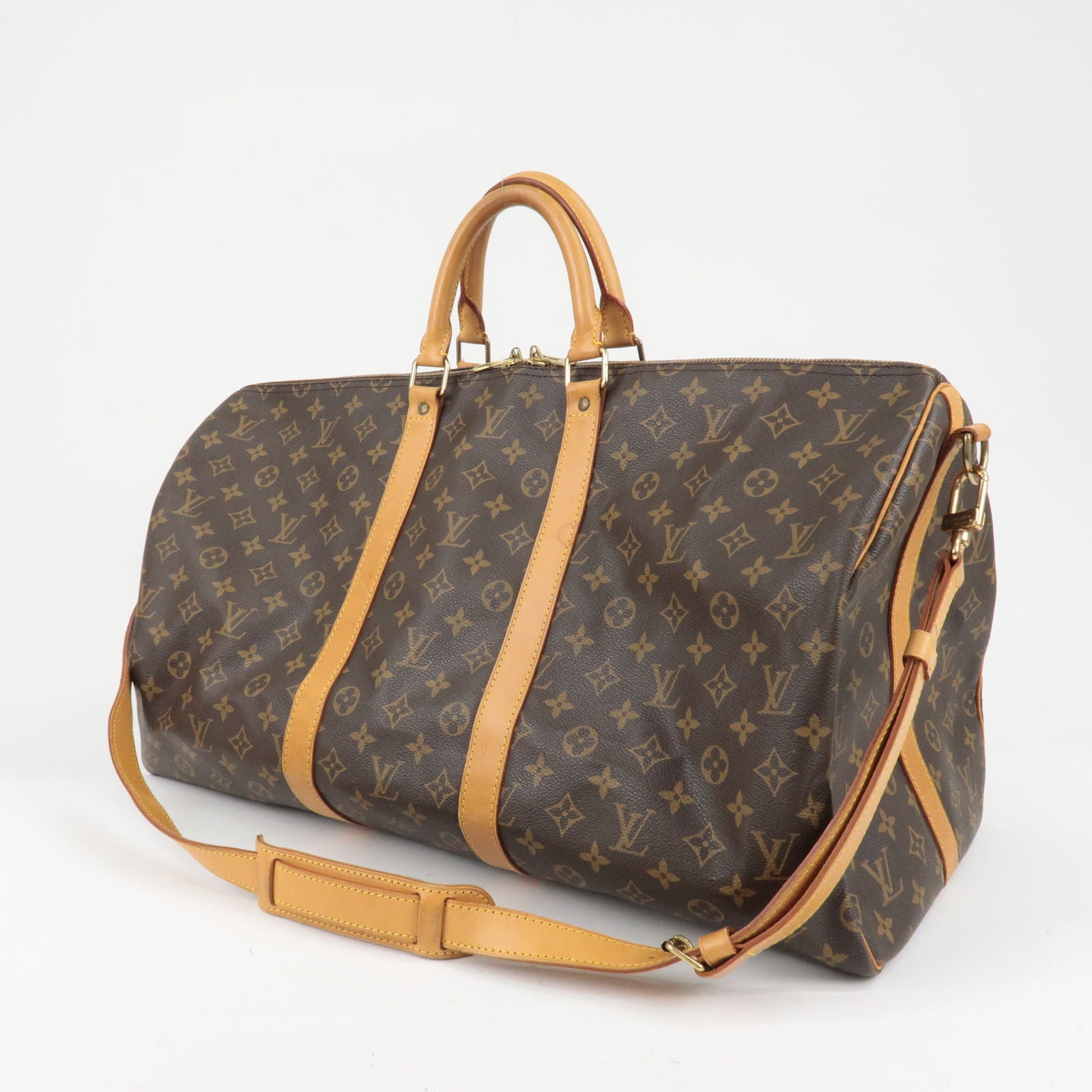 Keepall Louis Vuitton clutch 26 Monogram limited series patches Brown  Leather ref.657125 - Joli Closet