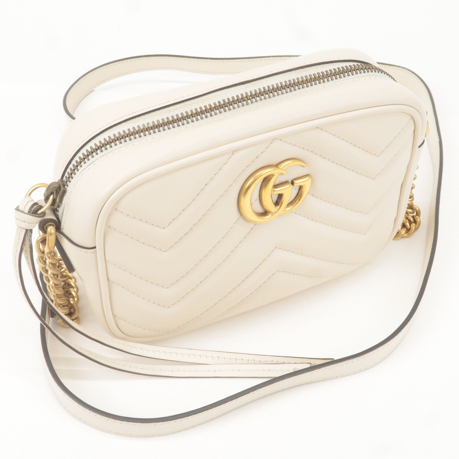 Gucci Marmont matelasse GG small ivory leather shoulder bag.