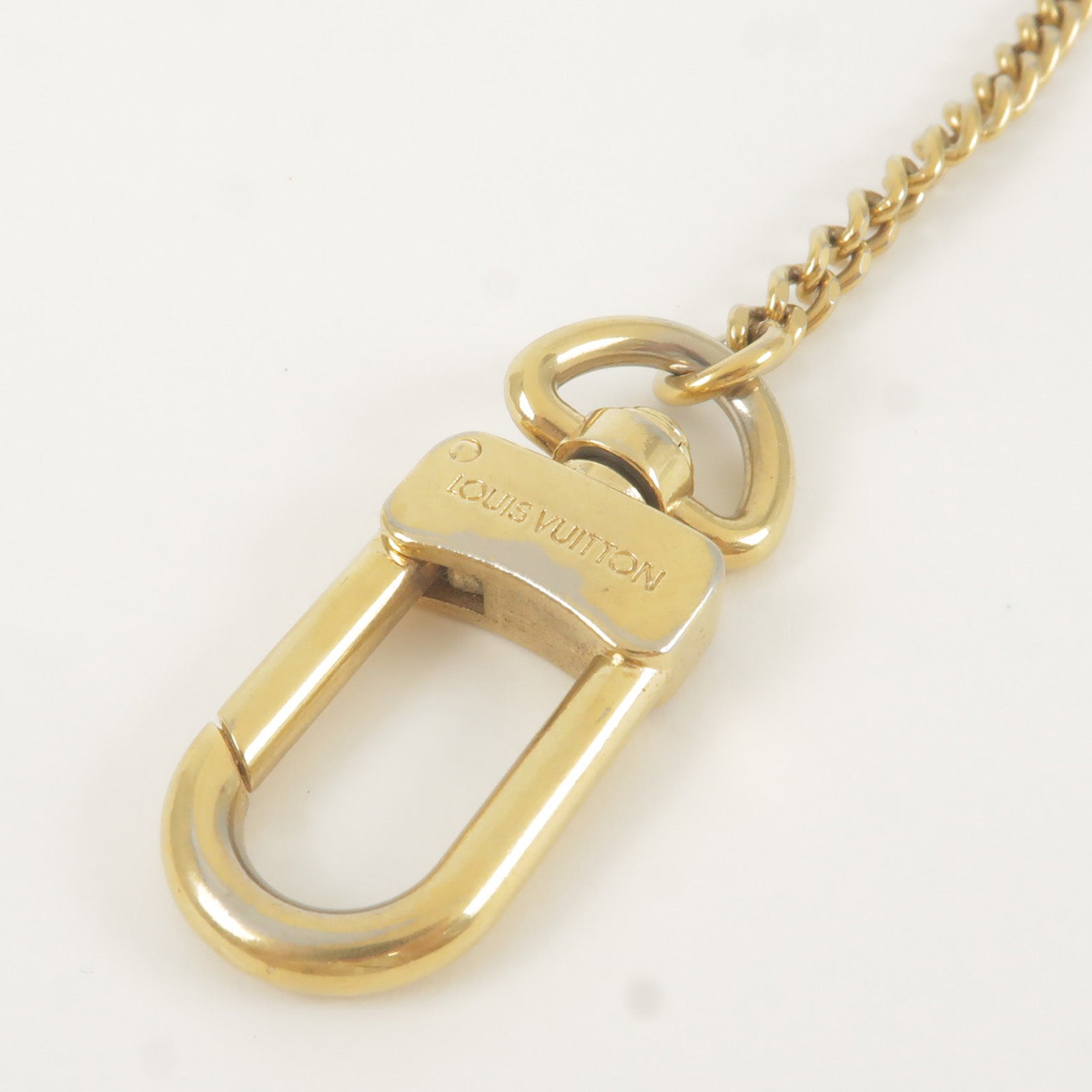 louis-vuitton key chain gold