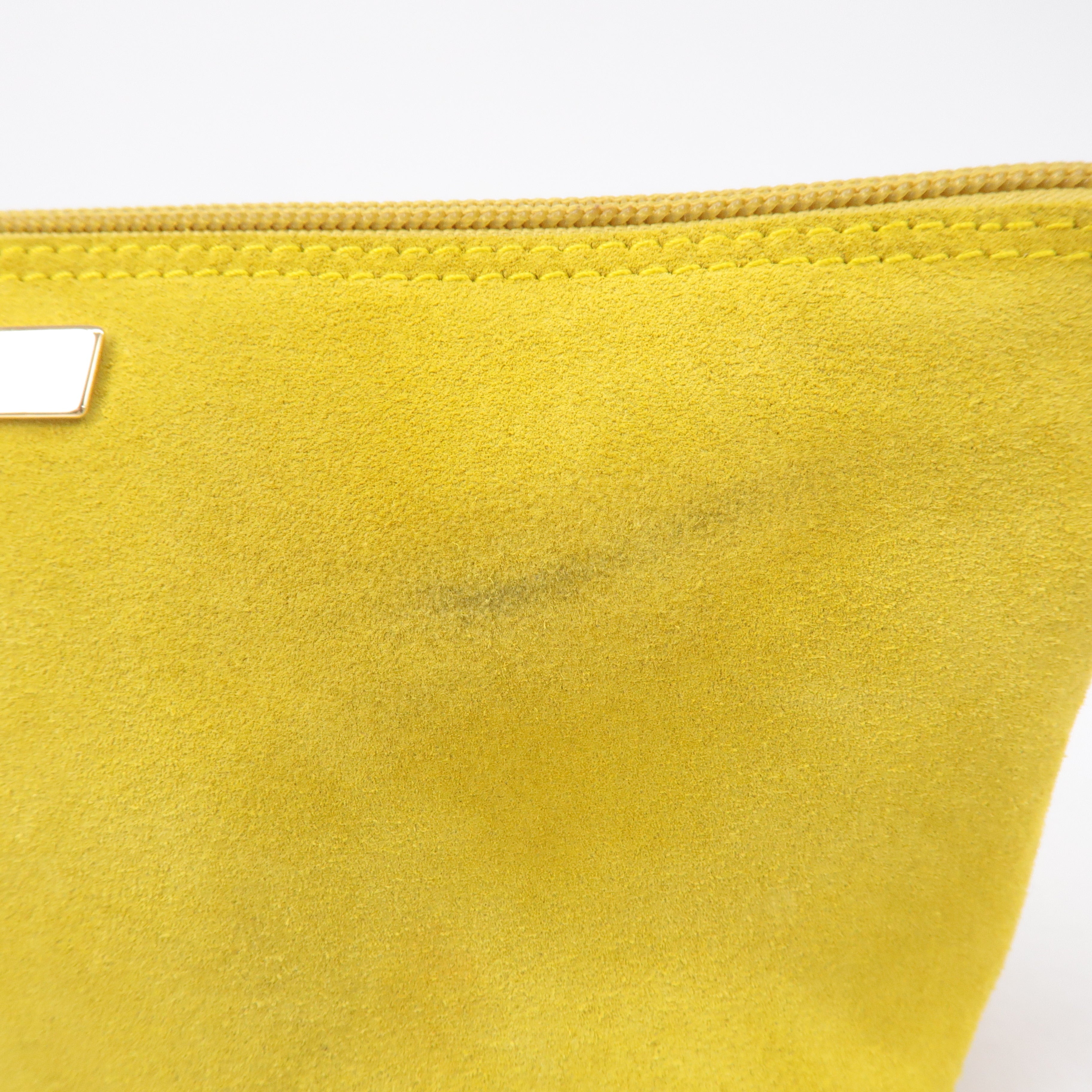 Yellow suede clutch online bag