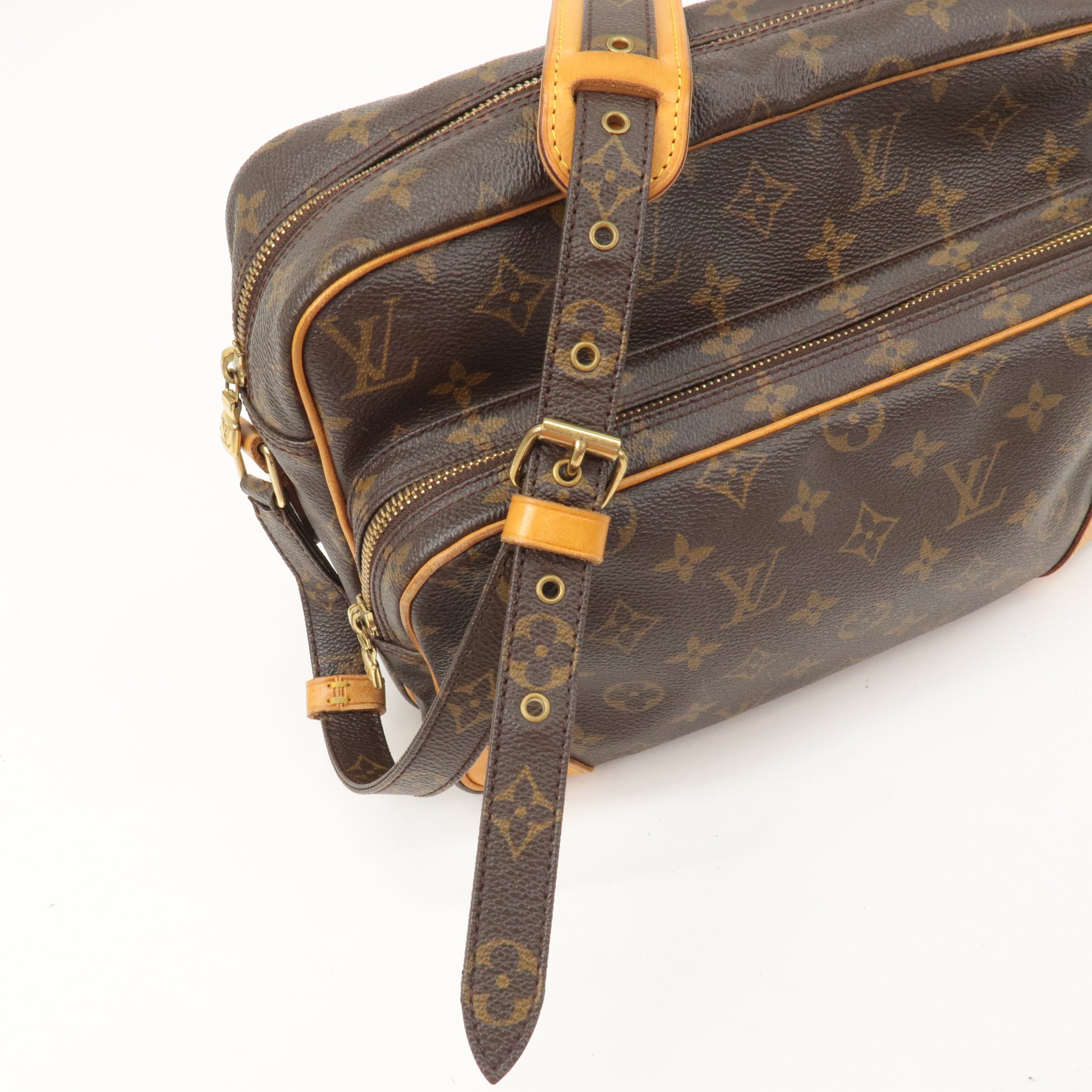 WHAT GOES AROUND COMES AROUND Louis Vuitton Monogram Nile Bag
