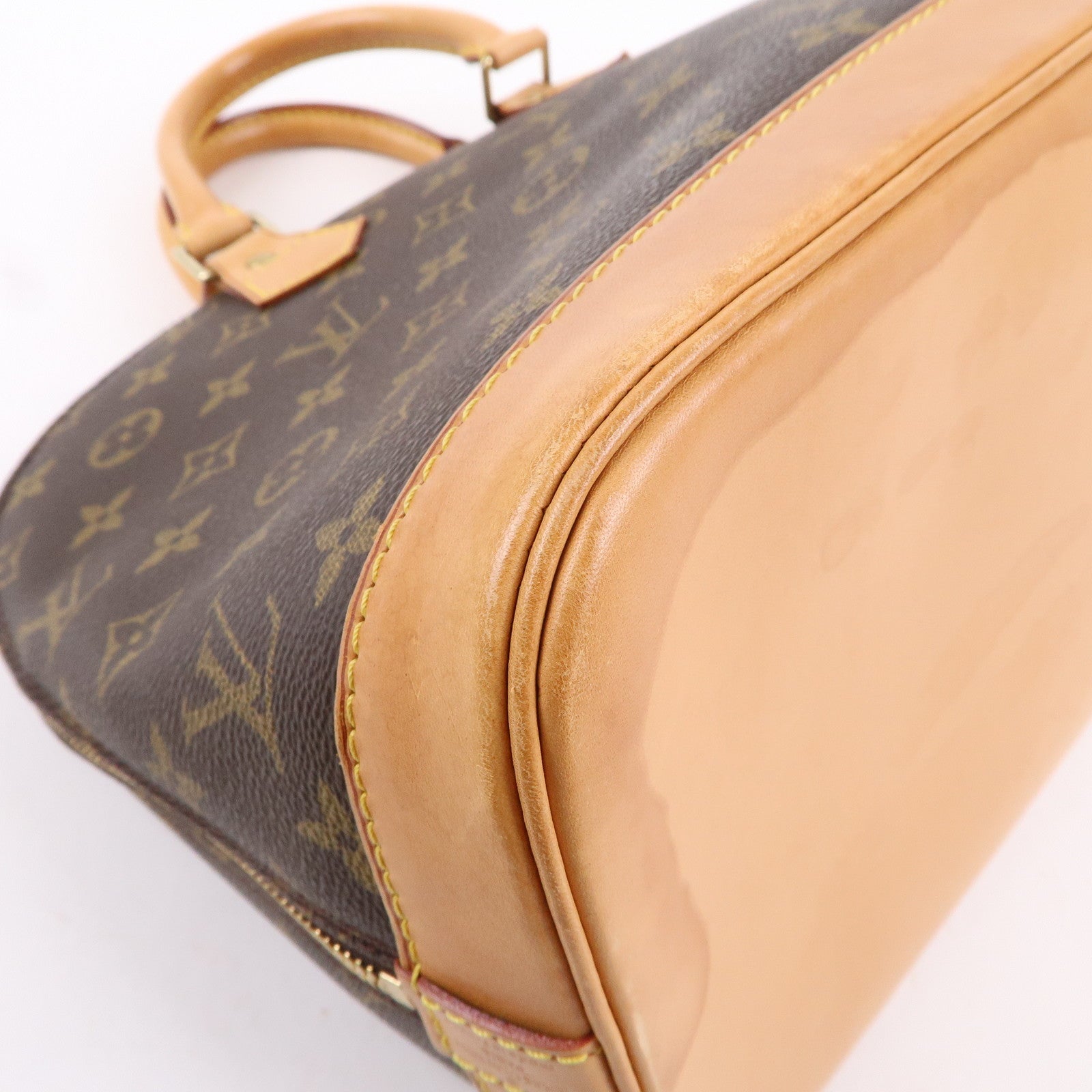 Louis Vuitton Monogram Alma Hand Bag Brown M51130