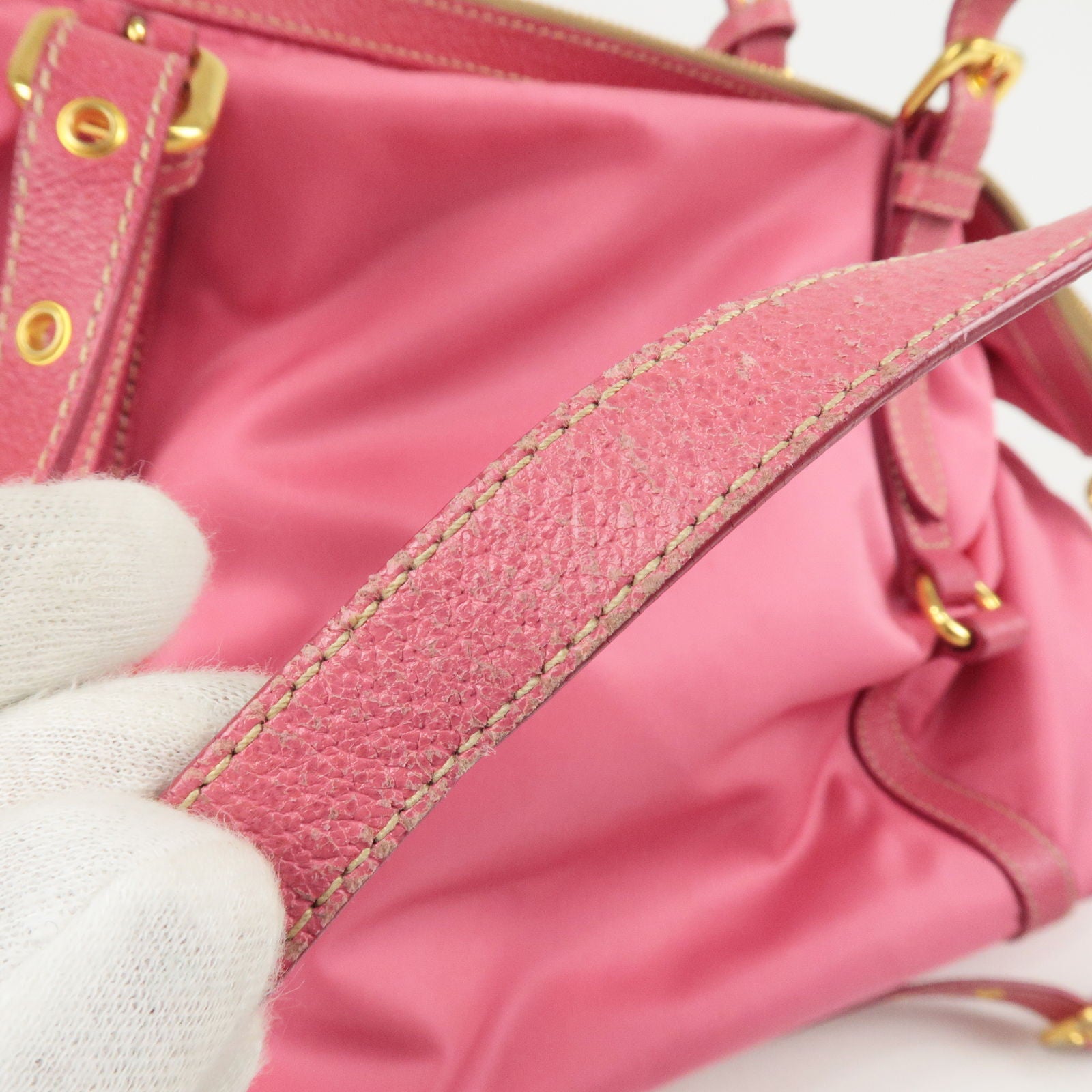 Showing off two pink Prada nylon bags available for sale in my