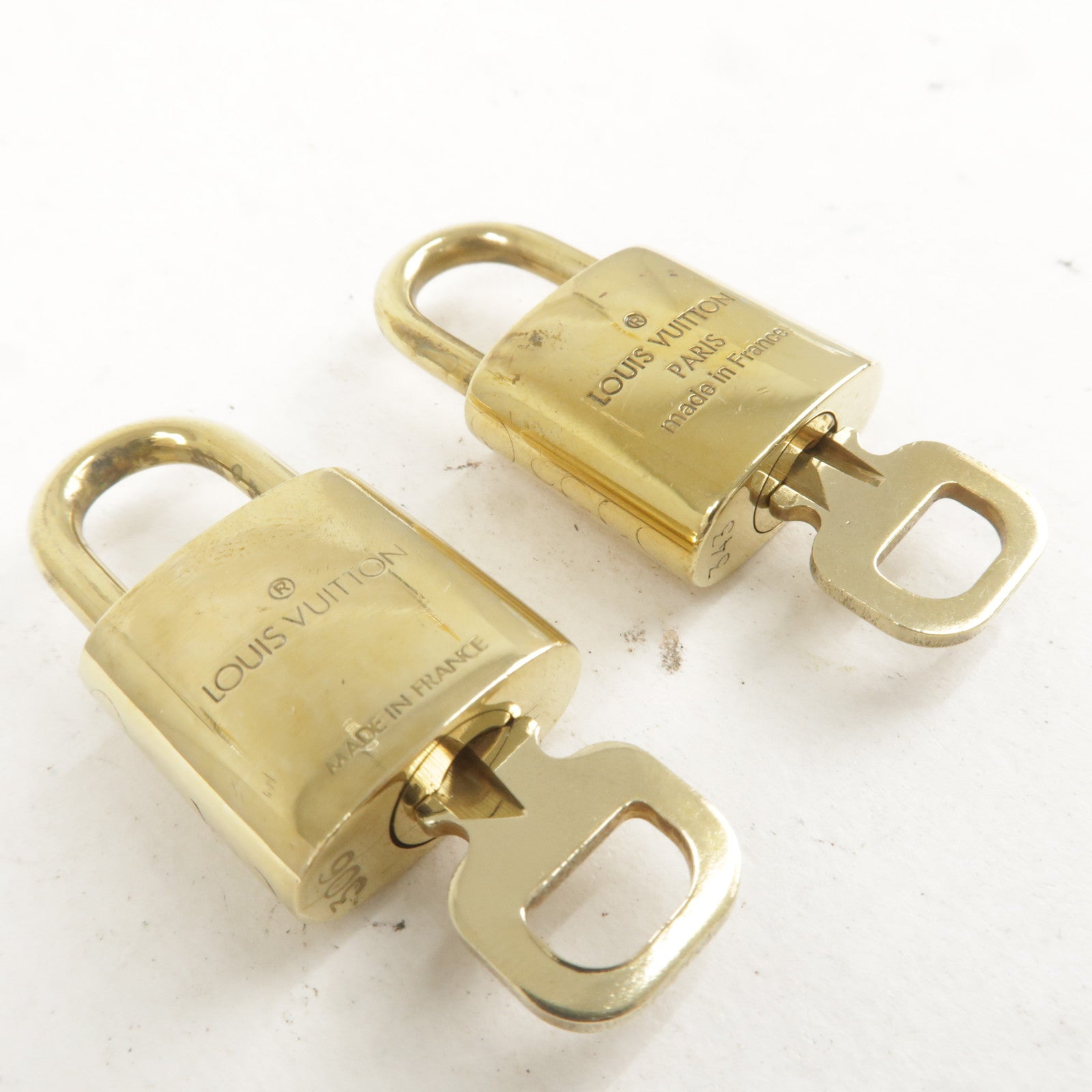 Authentic LOUIS VUITTON Brass Padlock with Matching Key (LV Lock
