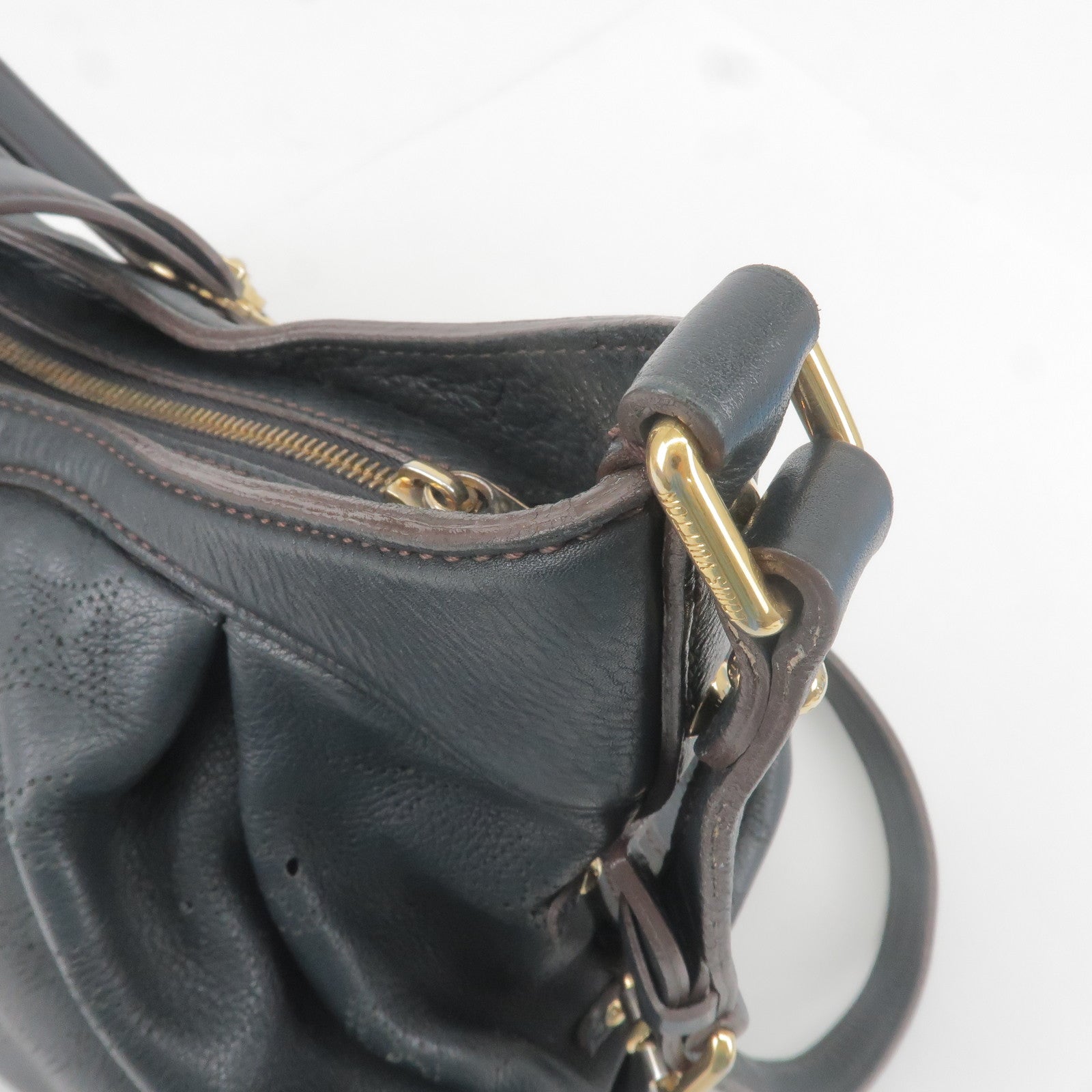 Authentic Louis Vuitton Mahina XS Shoulder Bag Silver Monogram