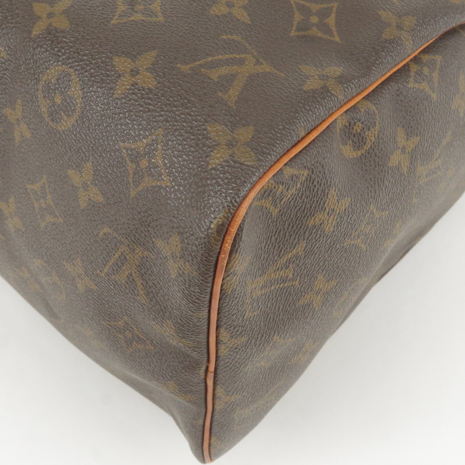 LOUIS VUITTON, a monogram canvas and metallic 'Speedy 30' handbag