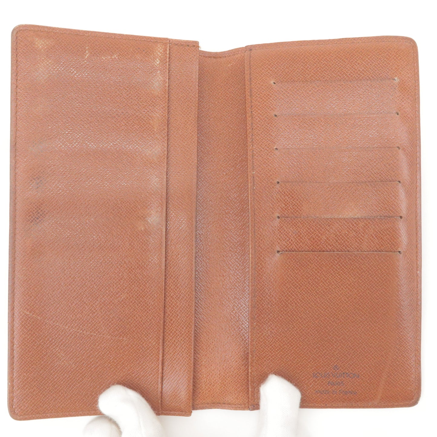brown louis vuitton wallet inside