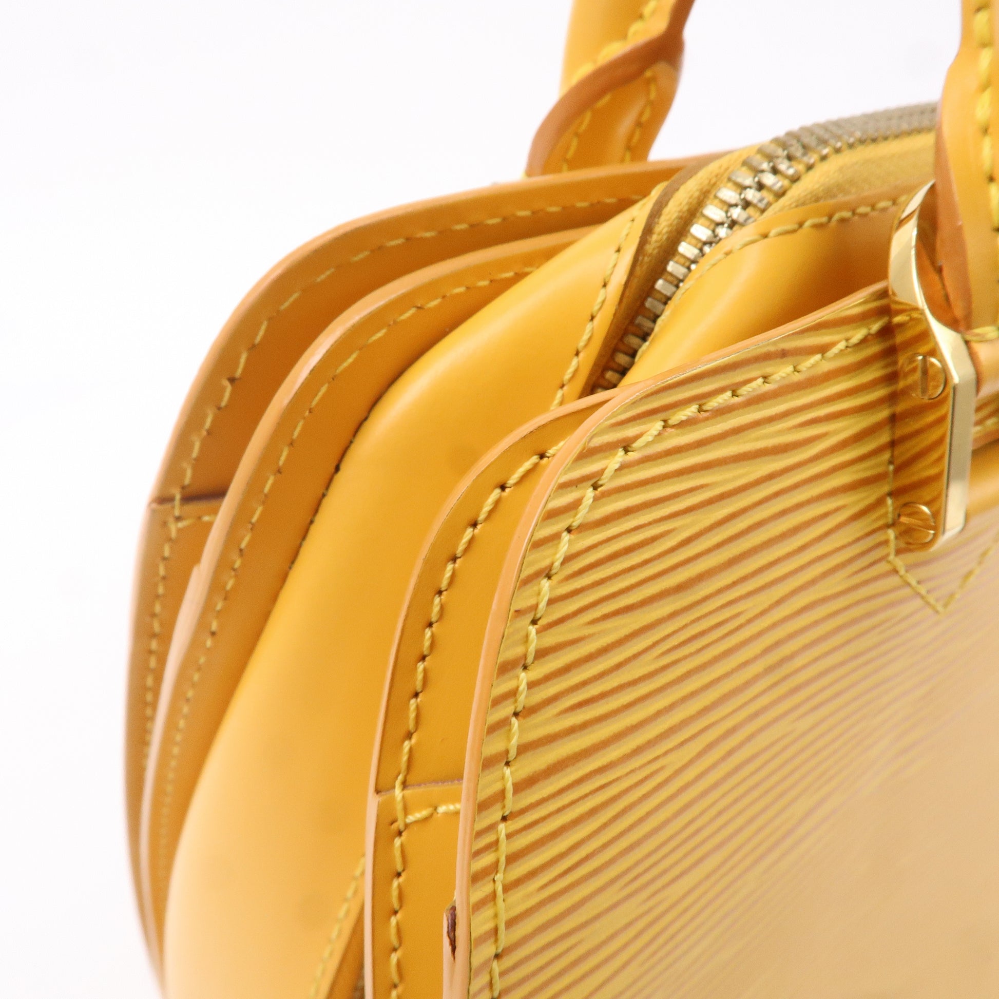 Authentic Louis Vuitton Tassil Yellow Epi Leather Alma PM, wallet and,  wrislet