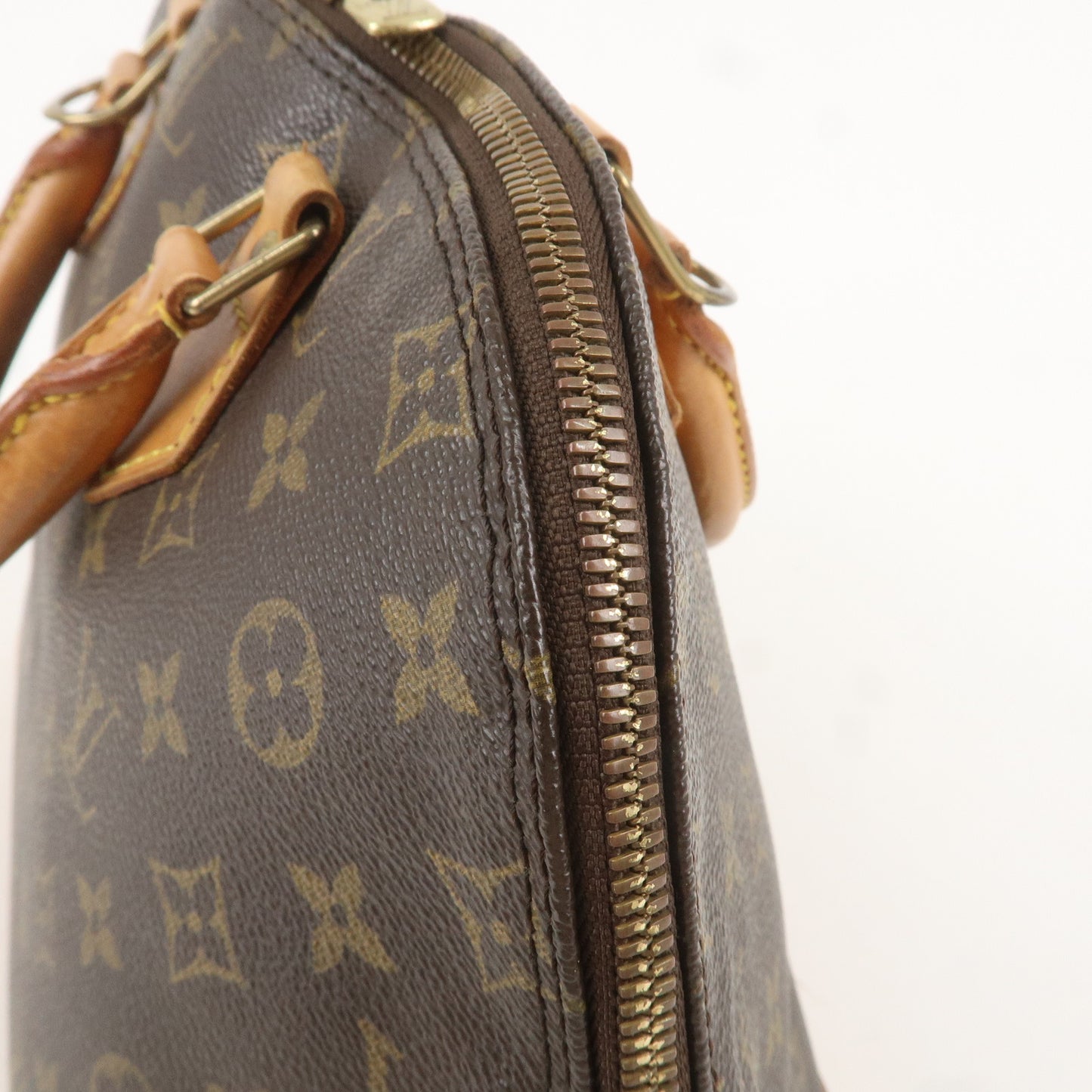 Louis Vuitton Monogram Alma Hand Bag Brown M51130