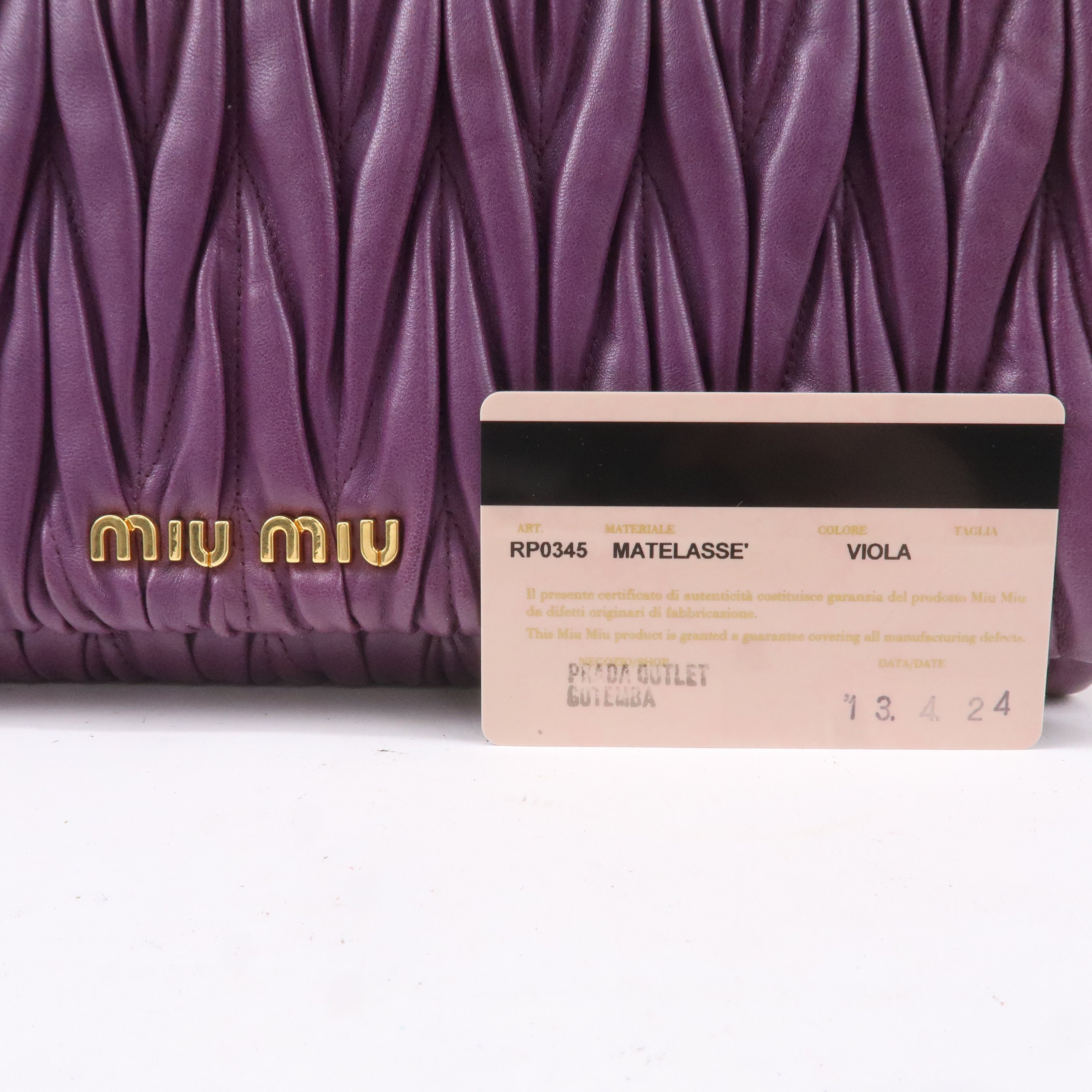 Miu Miu logo-lettering matelassé shoulder bag - Purple