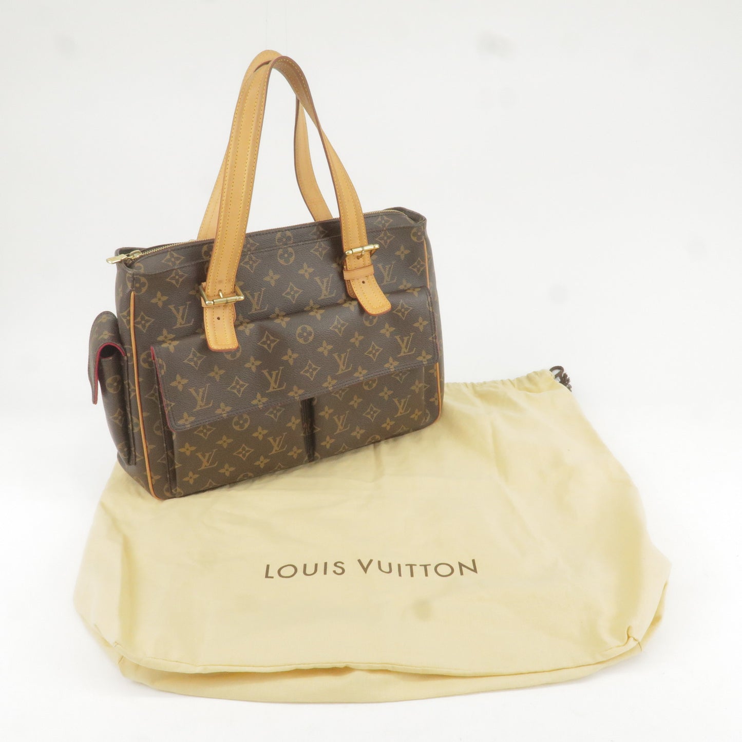 LOUIS VUITTON. Shoulder bag in navy leather and monogram…