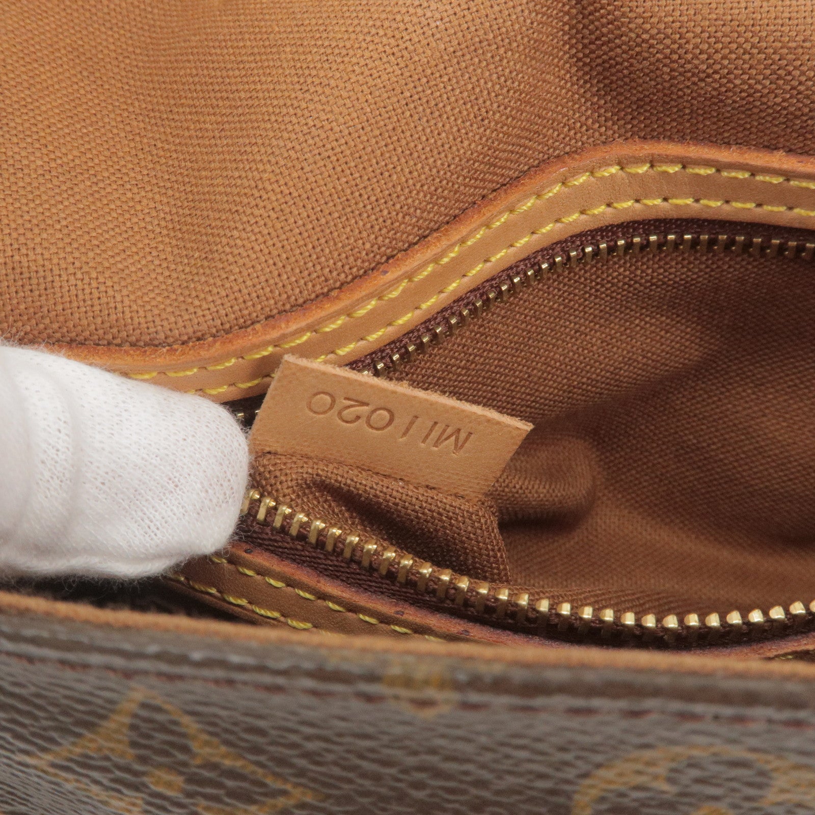 Louis Vuitton Neo Greenwich travel bag in brown canvas, golden