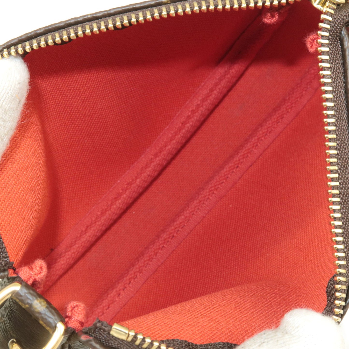 Louis Vuitton Monogram Vivienne Mini Pochette Accessoires M69976